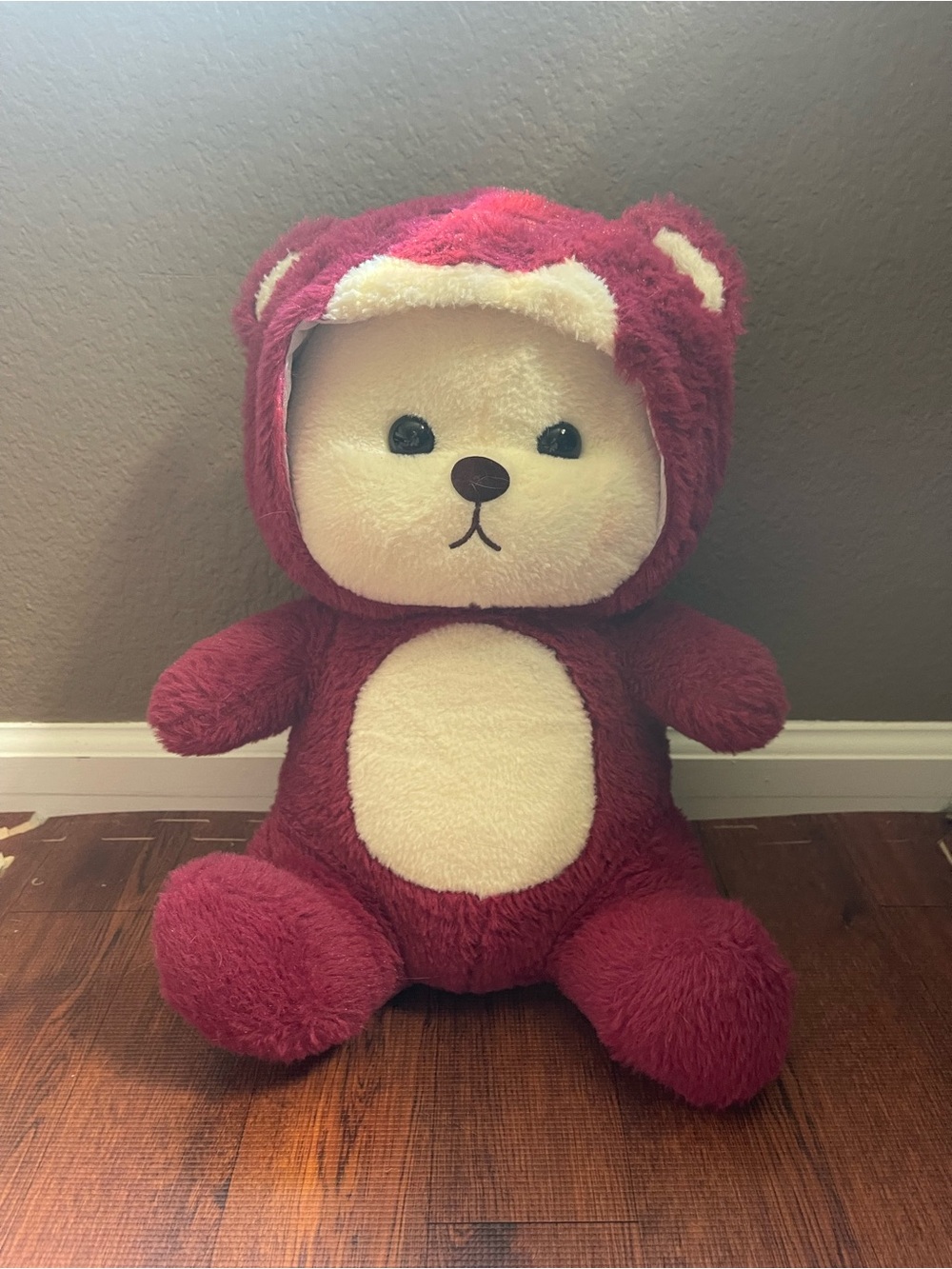 Pink and white teddy bear with hood